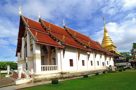 Golden Pagoda and blue sky, Wat Phra Thad Chang Kham, Nan Thailand