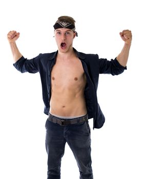 Expression of joy for victory on handsome young man with arms open and fists raised