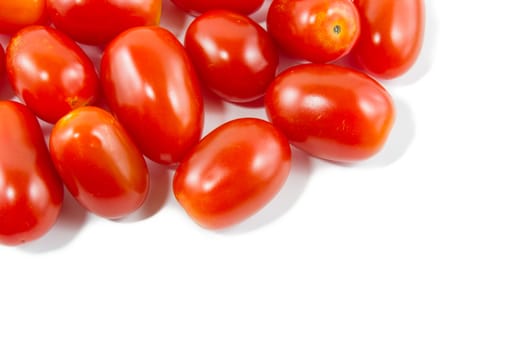 Group of cherry tomatoes isolated on white background