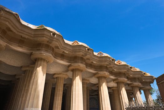 100 Doric columns hold the square above in Park Guell (1900-1914) of Barcelona - Spain. Architect Antoni Gaudi (1852-1926)