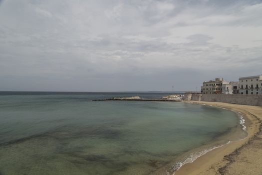 La Puritate (that is the purity) view: the beach of the old town of Gallipoli (Le) in the southern of Italy