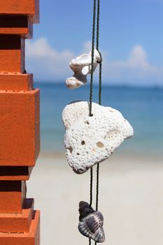 handcraft mobile with coral at the seaside