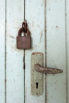 old Key and hole key on wooden door