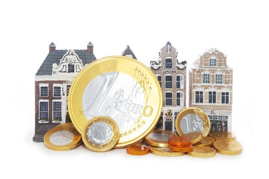 miniature dutch houses and euro coins