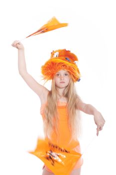 young blond girl waving orange hat and flags in studio against white background