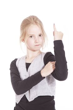 young blond girl giving the finger in studio against white background