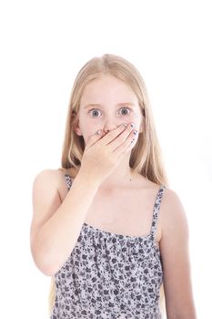 young blond girl with astonished expression in studio against white background