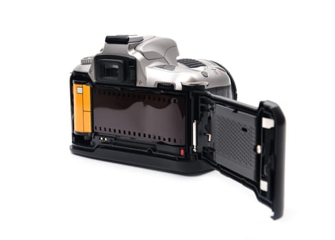 camera with 35 mm film on white background