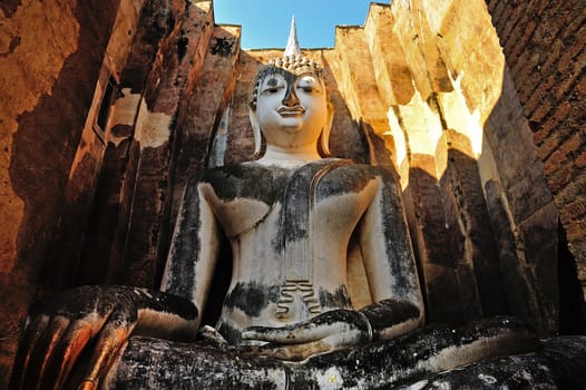 Ancient buddha statue. Sukhothai Historical Park, Sukhothai Province, Thailand