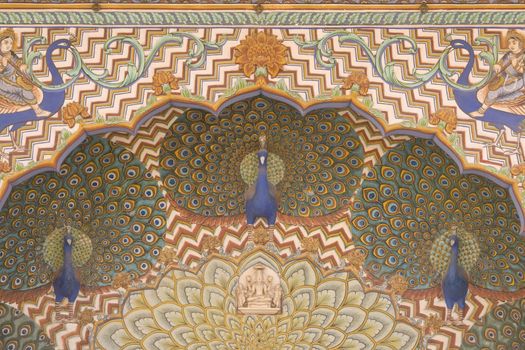 Ornate archway decorated with peacocks. City Palace, Jaipur, Rajasthan, India