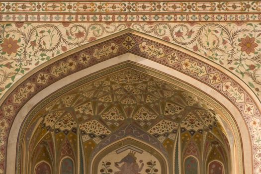 Detail of ornately decorated gateway (Ganesh Pol) inside Amber Palace, Jaipur, Rajasthan, India