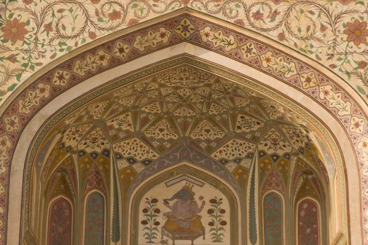 Detail of ornately decorated gateway (Ganesh Pol) inside Amber Palace, Jaipur, Rajasthan, India
