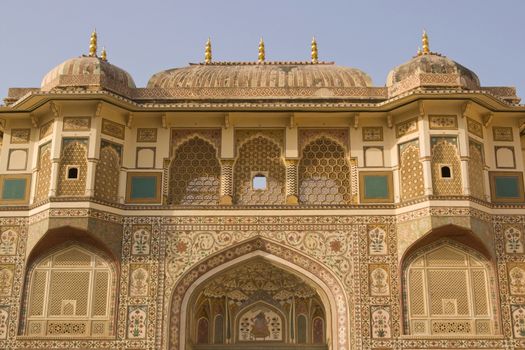 Ornately decorated gateway (Ganesh Pol) inside Amber Palace, Jaipur, Rajasthan, India