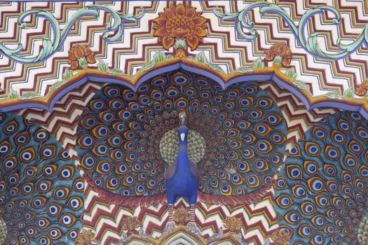 Ornate archway decorated with peacocks. City Palace, Jaipur, Rajasthan, India