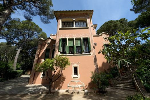 BARCELONA, SPAIN - JUNE 10, 2014: house of Antoni Gaudi and museum in the Park Guell on June 10, 2014 in Barcelona. The park is with other works of Gaudi part of the Unesco world heritage sites. 