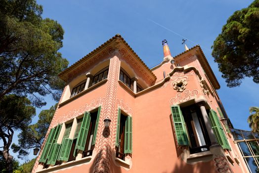 BARCELONA, SPAIN - JUNE 10, 2014: house of Antoni Gaudi and museum in the Park Guell on June 10, 2014 in Barcelona. The park is with other works of Gaudi part of the Unesco world heritage sites. 