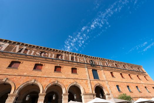 BARCELONA, SPAIN - JUN 10, 2014: the building "Palau de Mar" (1880-1890) home of museum "Museu d'Historia de Catalunya", Barcelona in front of the harbor, Spain