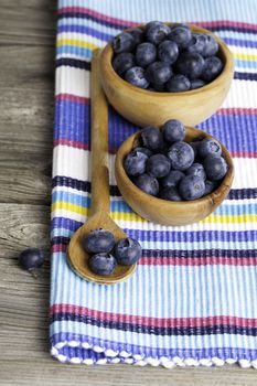 Fresh Blueberries on wooden Background