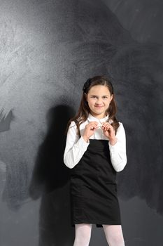 A child at the blackboard