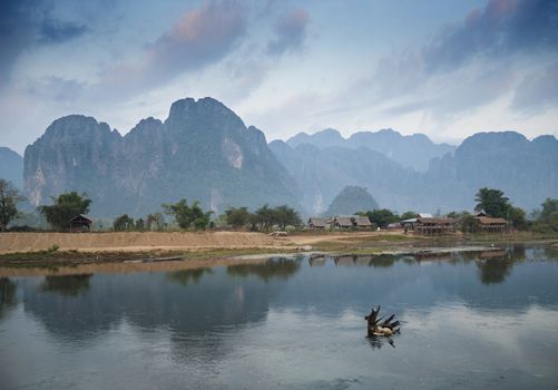 karst landscape and river in vang vieng laos