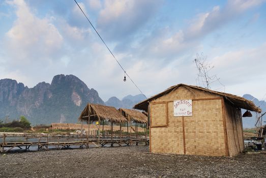 riverside bars and karst landscape in vang vieng laos