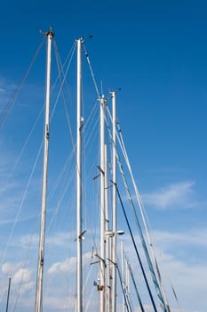 sail ship mast with blue sky in background
