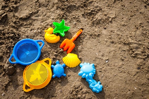 colorful beach toys for kids in sand