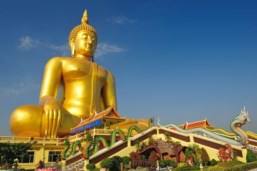 Golden Buddha statue at Wat Muang in Angthong, Thailand