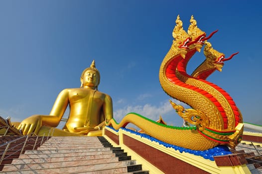 Golden Buddha statue at Wat Muang in Angthong, Thailand