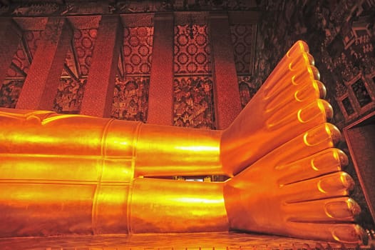 The feet of Reclining Buddha statue in Thailand Buddha Temple Wat PO
