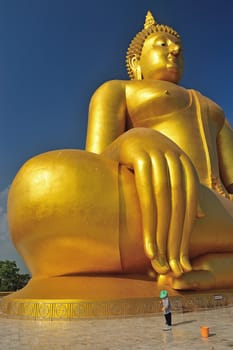 Golden Buddha statue at Wat Muang in Angthong, Thailand