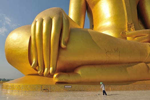 Golden Buddha statue at Wat Muang in Angthong, Thailand