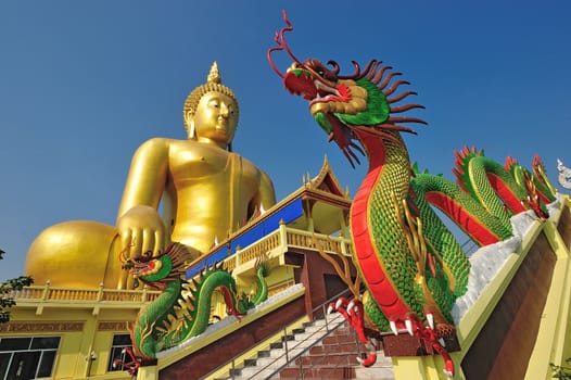 Golden Buddha statue at Wat Muang in Angthong, Thailand