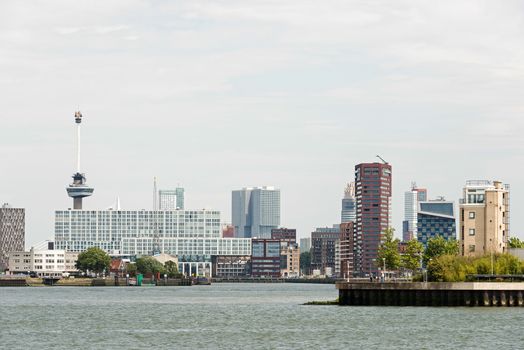 rotterdam dutch city skyline with euromast harbor offices and houses