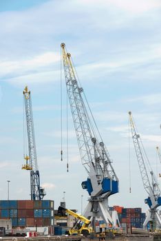 big cranes for transport of containeers in dutch harbor