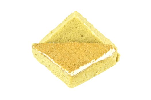 Yellow coffee chiffon cake place as triangle isolated on white background.