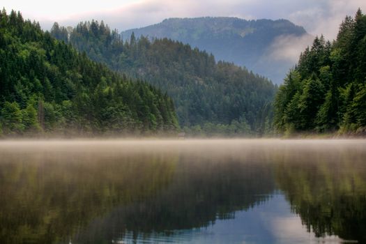 Tranquil lake in the high mountains Alps Austria