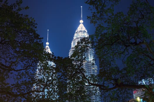 Top of Twin Towers in Foliage.  Kuala Lumpur EDITORIAL
Kuala Lumpur Malaysia  June 17 2014.