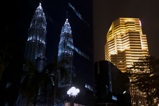 Reflection.Street near Petronas Twin Towers in Kuala Lumpur. EDITORIAL
Kuala Lumpur, Malaysia, June 17 2014.