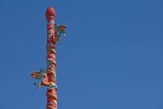 Dragon sculpture chinese style on the Chinese temple in Chonburi Thailand