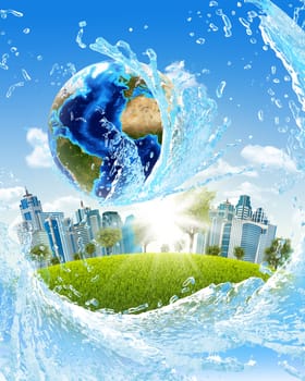 Earth, green grass, skyscrapers and water. Elements of this image are furnished by NASA