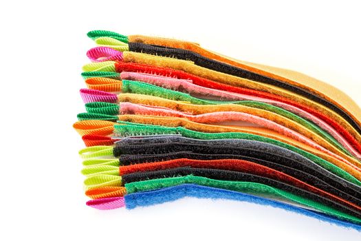 Pack of Colorful Velcro Strips, on white background