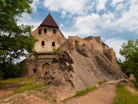 Old gate and ruined facade of Tocnik castle (Czech Republic)