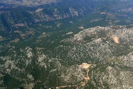 Mountains covered with trees. Top view. Natural landscape