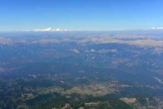 Mountains covered with trees. Top view. Natural landscape