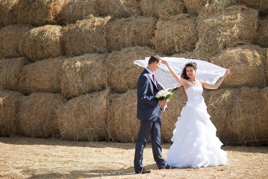 couple near the hay