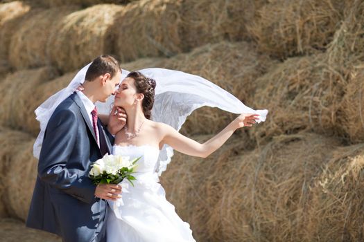 couple near the hay