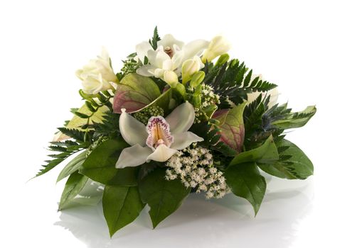 flower arrangement with lilys freesia and arum