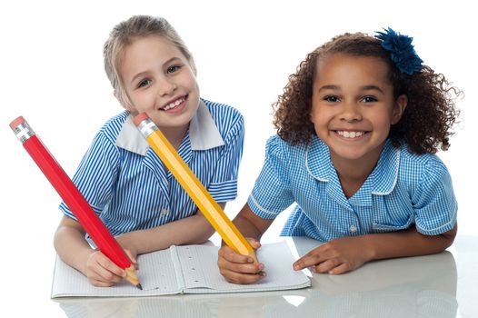 School girls doing homework together