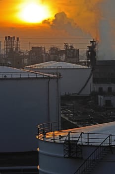 Oil Refinery factory at sunset